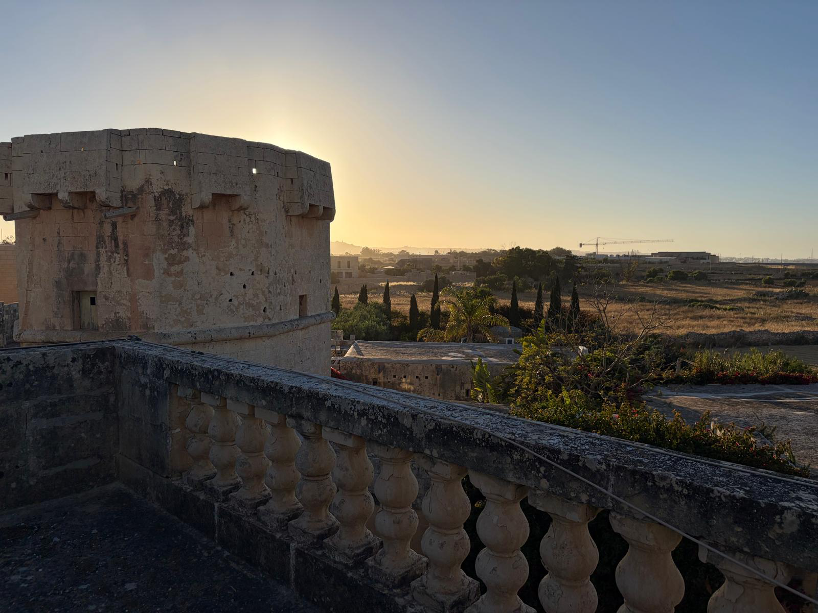 Historic stone tower and surrounding countryside